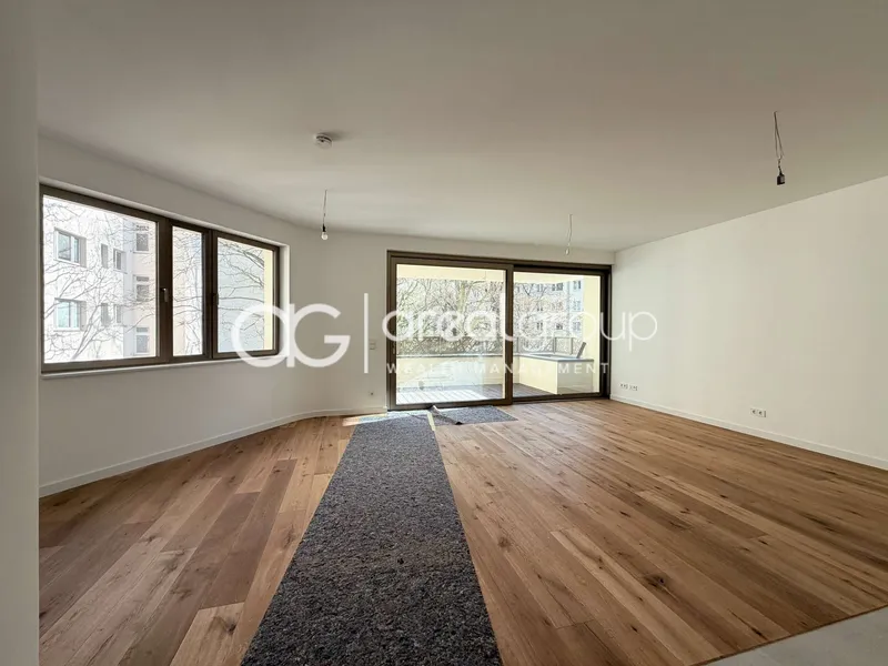 Stilvolle 3-Zi-Whg. mit großzügigem Wohnbereich & Außenfläche — photo 1